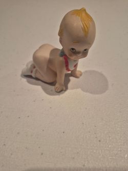 Kewpie porcelain statue