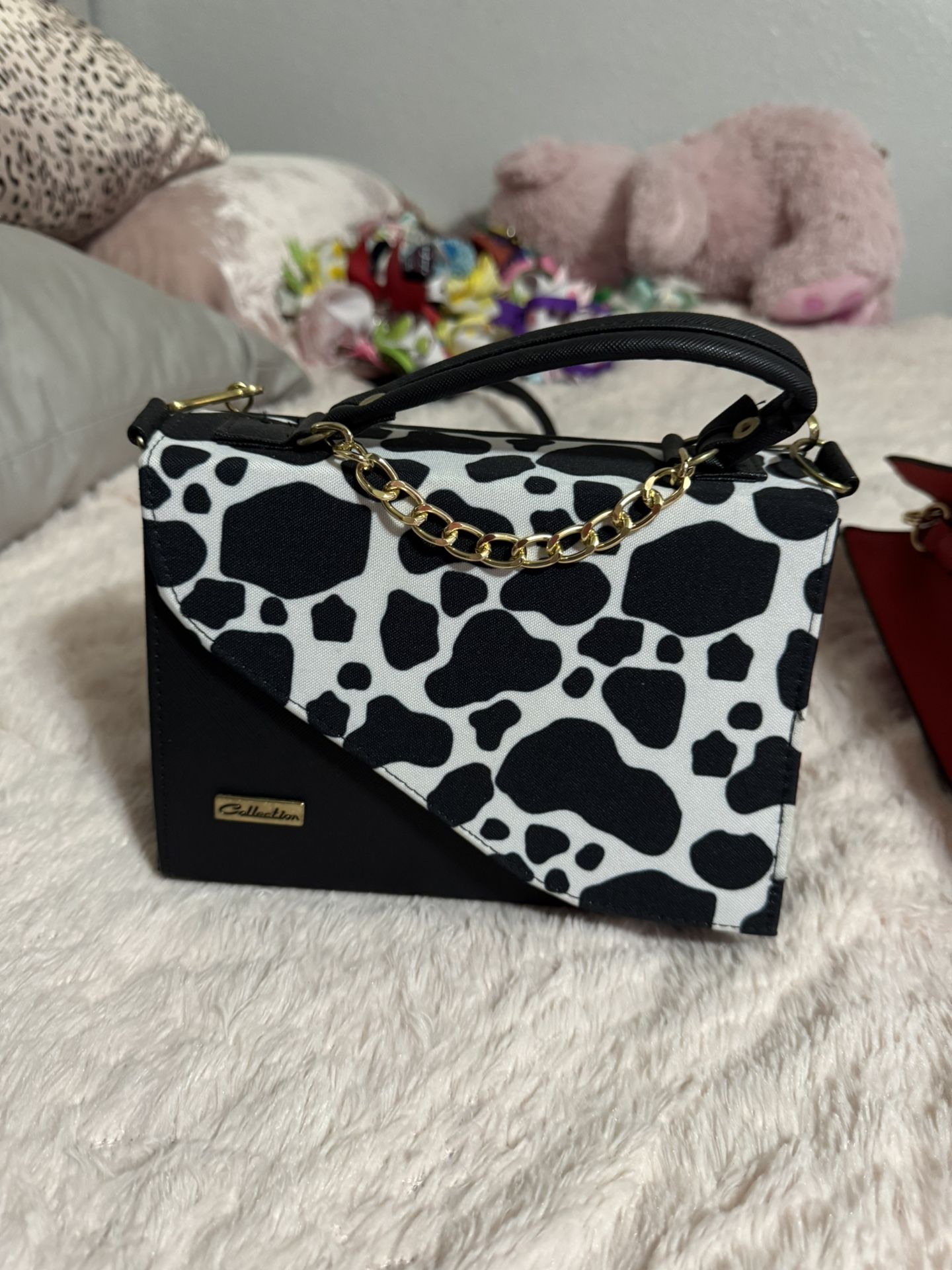 Black cow print purse
