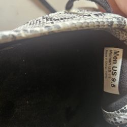 White And Black Design Van's Shoes For Men For A More Casual And Comfortable Look