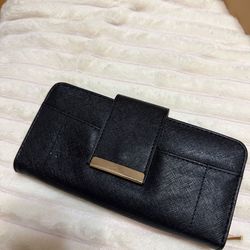 Various purses and handbags and wallets