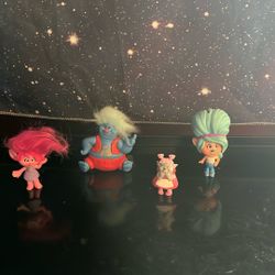 4 Trolls Figurines$10.00 All