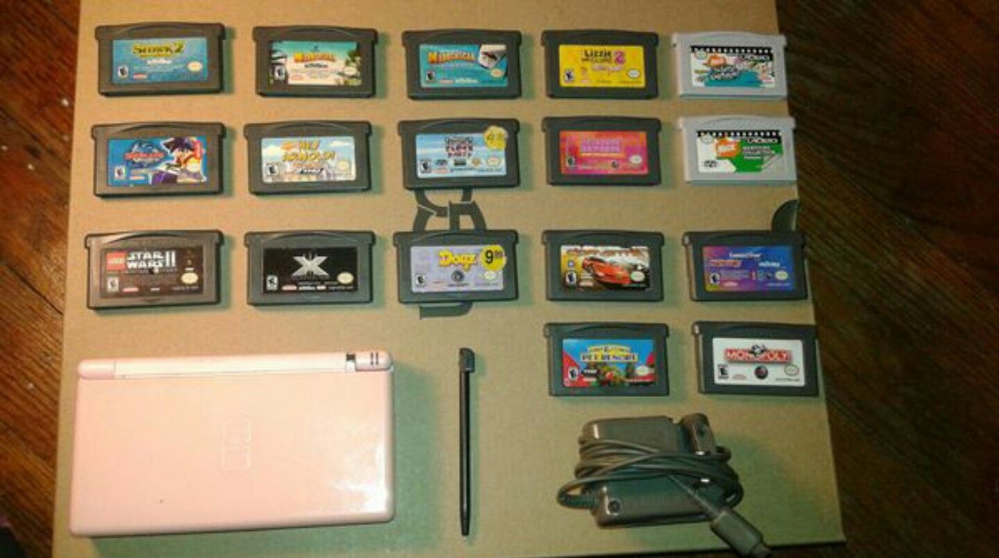 Pink Nintendo DS Lite With Charger, Stylus, 15 Games and 2 TV Cartridges