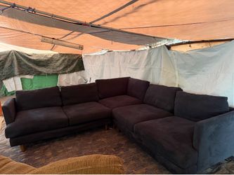 Navy blue blackish color Couch living spaces good condition clean we sell all the time delivery $40