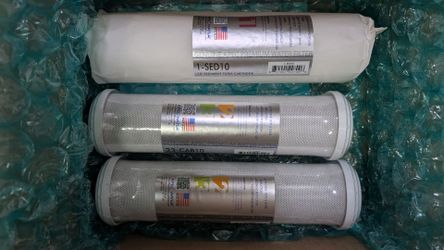 Three new genuine APEC replacement-filter sets.