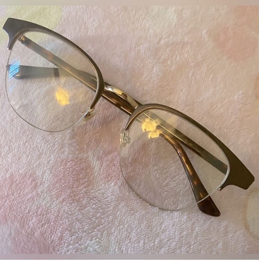 GUCCI  eye glasses frames  (GG0131O) like new