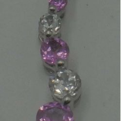 10KT WHITE GOLD PENDANT WITH WHITE AND PINK STONES 0.7 GRAMS MINT CONDITION. 858742-10.