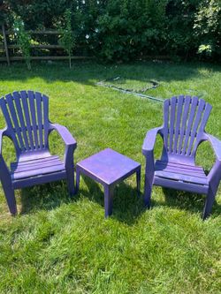 Plastic Adirondack chairs n table