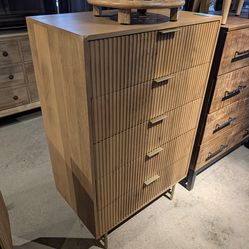 Fluted five drawer tall boy