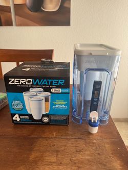 ZeroWater Water Filtration Dispenser with 2 NEW extra filters and one inside. Water dispenser.