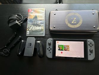 Nintendo Switch with Zelda, Luigi’s Mansion and Accessories Bundle