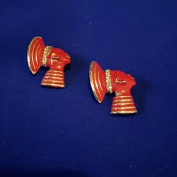 Two Red And Golden Pins