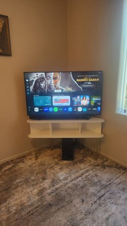 White and gold corner TV stand