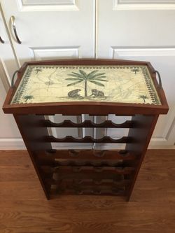 Wine bottle and glass rack with removable serving tray 33” tall, 22” wide, 12” deep