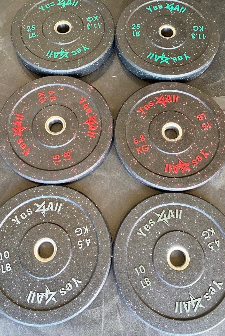 New set of 25 pound 15 pound and a 10 pound bumper weights