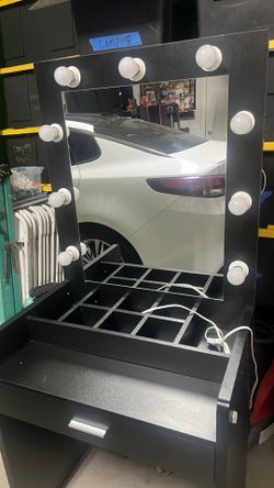 Black vanity with lights