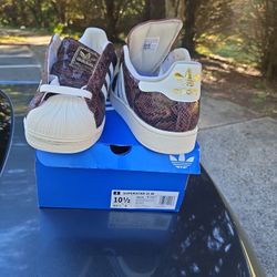 Unisex Adidas W Size 10,5, Men Size 9.5