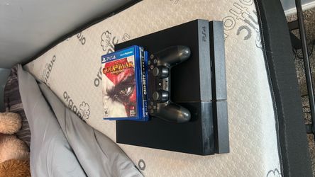 Sony PS4 Console with Controller and 2 Games