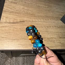 Yellow, blue tiger eye and hematite brackets