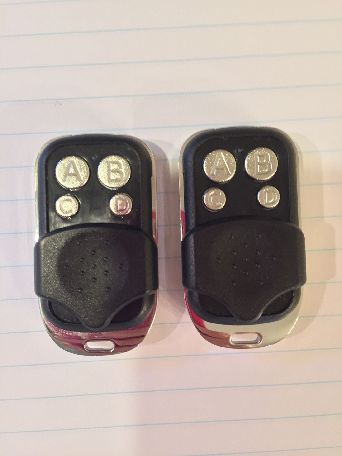 NEW: Pair of garage door opener remote controls keychain fobs- Genie compatible
