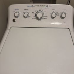 GE top load washer with multiple settings and Deep Fill option and GE dryer. 