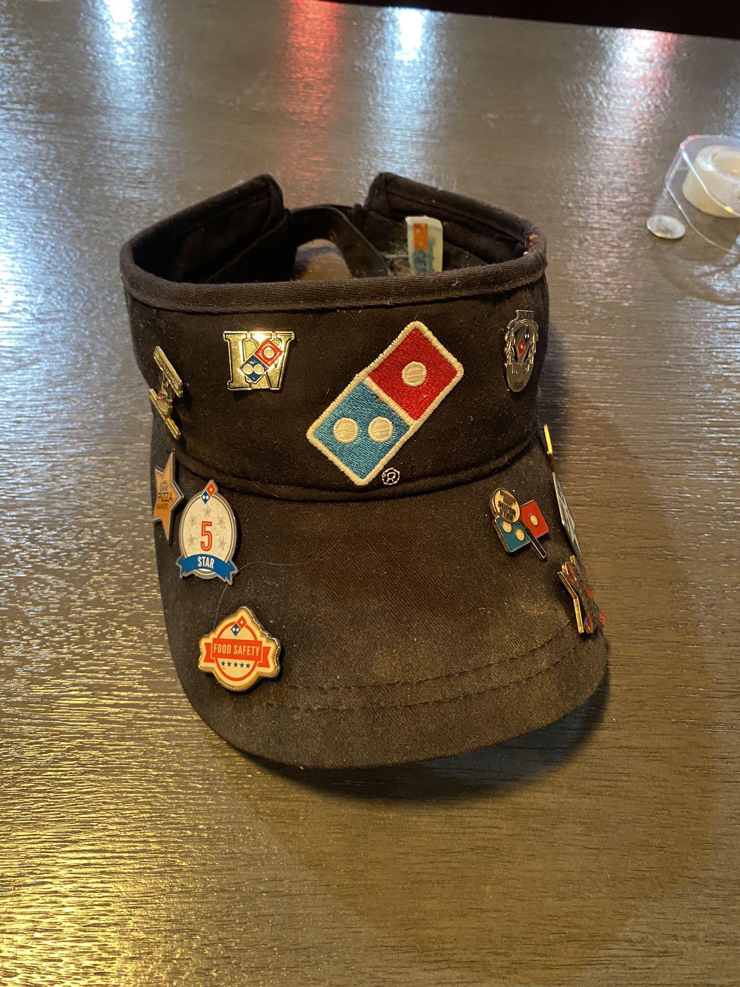 Domino’s hat with Badges