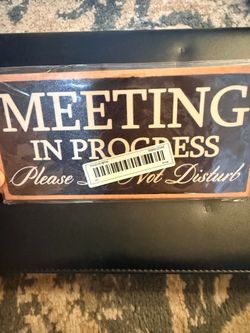 Wooden hanging meeting sign