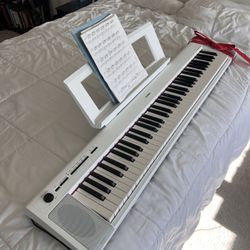 Yamaha NP32 76-Key Lightweight Portable Keyboard with PA130 Power Adapter, White