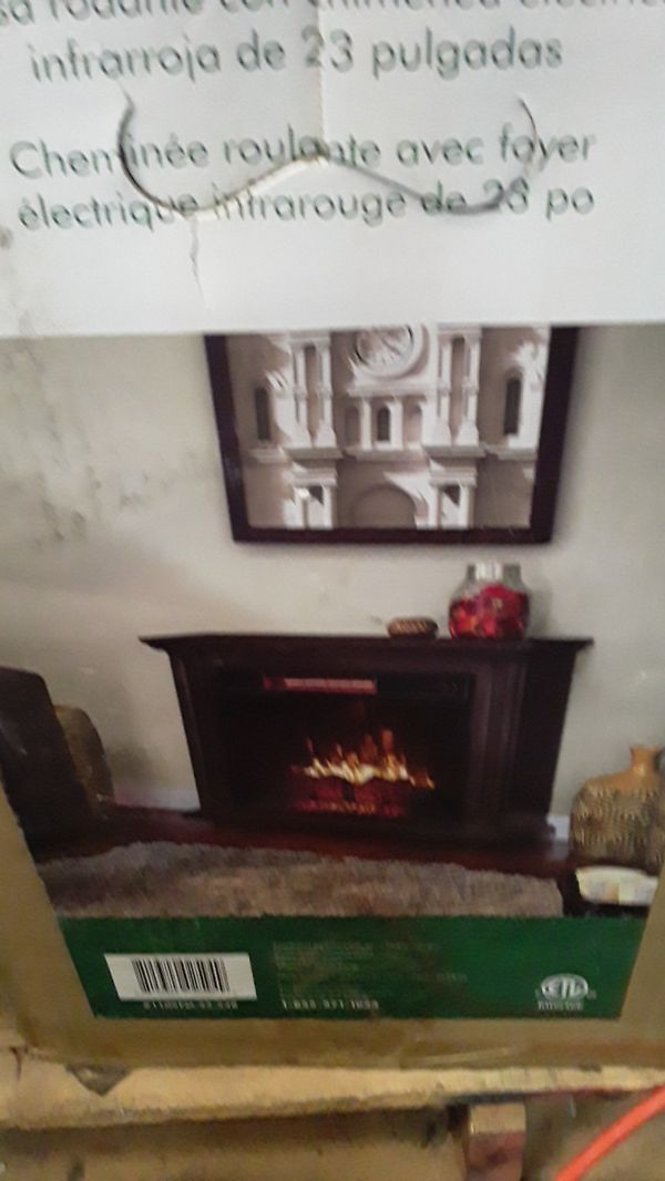 Green touch Tinley rolling mantel with 23in infrared electric fireplace for Sale in Hypoluxo, FL 