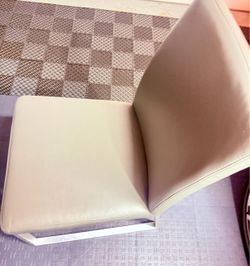 FREE LEATHER GRAY SIDECHAIR AND BLACK WEST ELM LEATHER CHAIR