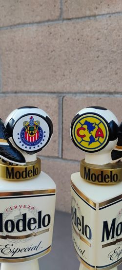 MODELO  ( CHIVAS & AMERICA ) TAP HANDLES . DODGERS & ANGELS BOBBLEHEADS AVAILABLE. ( ALSO PLENTY OF NEON SIGNS / LIGHTS AVAILABLE FOR SALE )