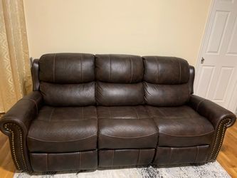 Brown sofa two sided recliner sofa.