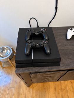 PS4 with controllers