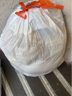 Three bags of clothes, stuffed animals and books!