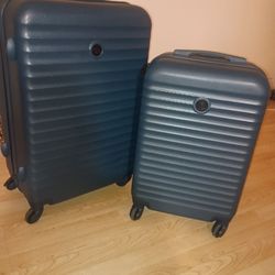 Protégé 2-Piece Hardside Spinner Luggage Set.