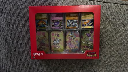 Pokémon card 4 pack tin