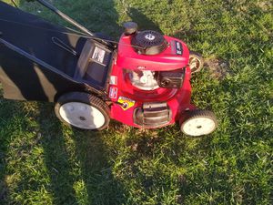 Photo I do trade-ins this is not self propelled it is a Troy-Bilt push with bag and mulcher with a Honda engine $85 must pick up beech Grove