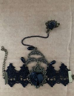 Steam punk cosplay wristlet and chain ring