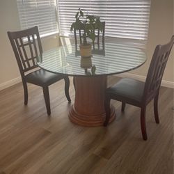 Glass Dinning Table with 4 chairs 