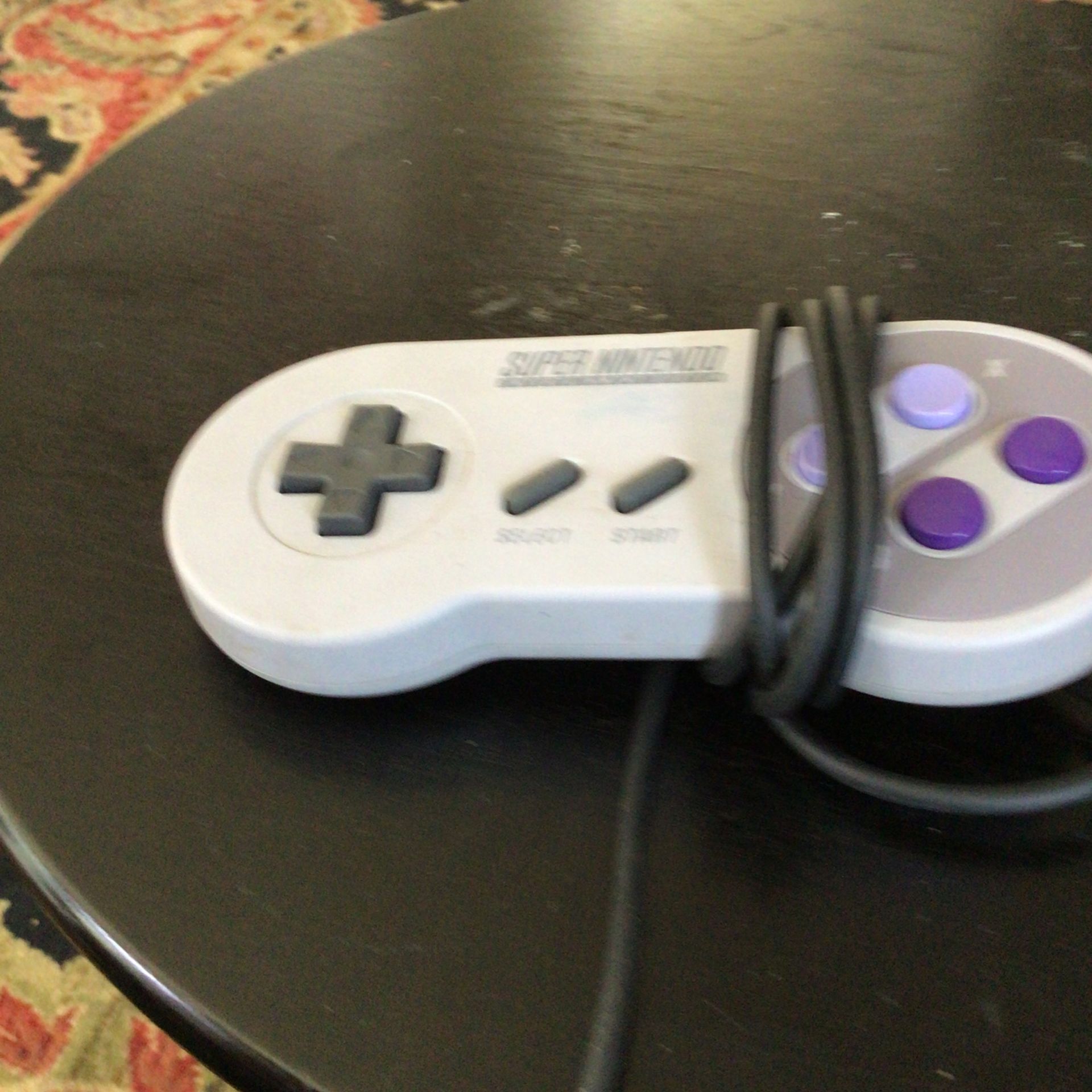 One Super Nintendo Controller