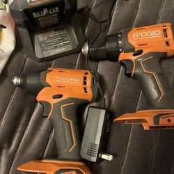 Ridgid Cordless And Impact Drills. With Charger No Battery’s