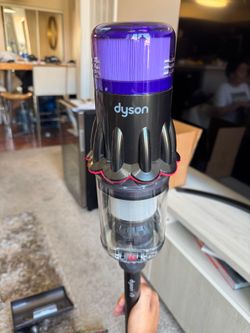 Dyson V9 vacuum with attachments