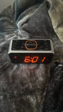 Emerson SmartSet Bluetooth Dual Alarm Clock Radio (Model is CKS1521) featuring a 1.4-inch orange LED display.