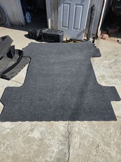 Truck bed rug
