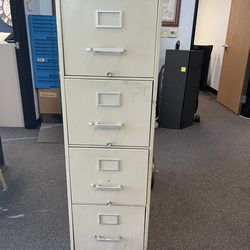 4 Drawer Metal File Cabinet – Commercial Grade – Used  Description: • 4 drawer vertical file cabinet • Heavy-duty metal construction • Commercial grad