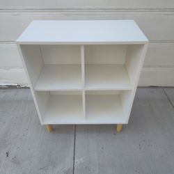 White IKEA Eket Cube Shelf with Wooden Legs