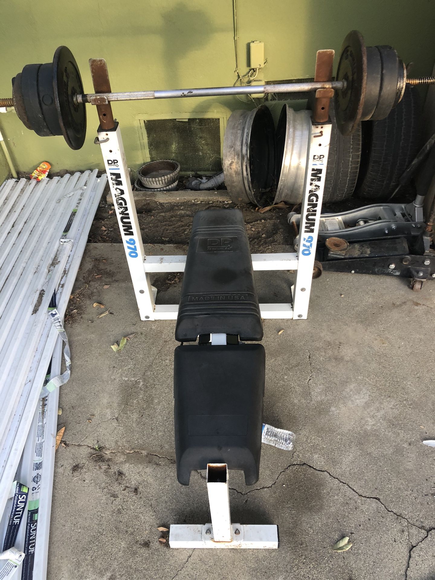 DP" Magnum 970 bench press with 95lbs worth of weights