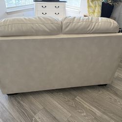 Cream Leather Love Seat 