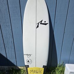 Rusty happy shovel surfboard