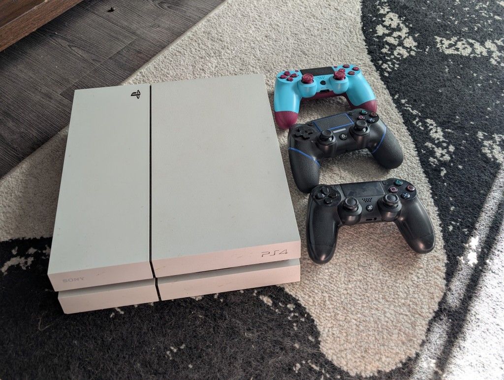 PS4 And 3 Controllers