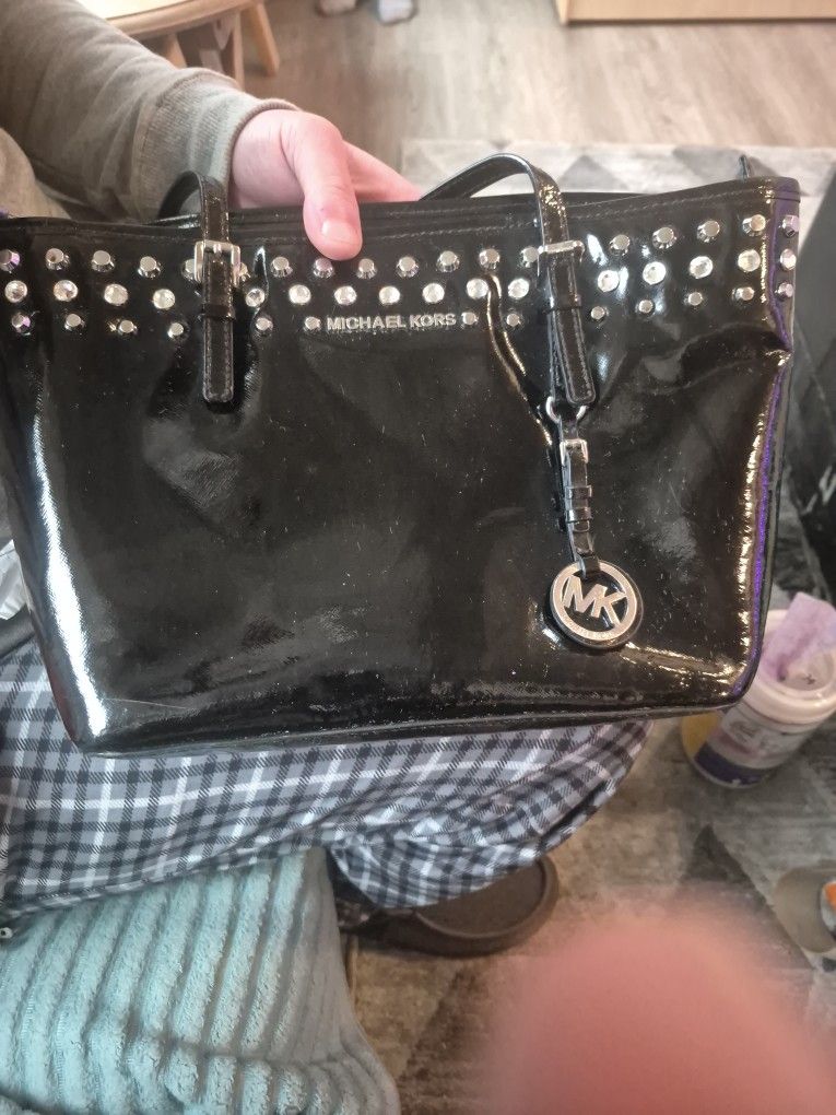 Mk.           MICHAEL KORS